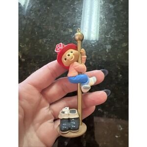1996 Hallmark Keepsake Ornament Fireman Bear  Sliding Down Fireman's Pole No Box